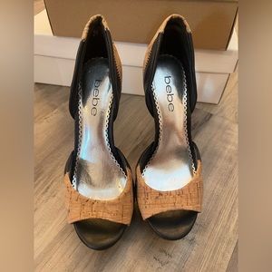 Slightly used BEBE cork/black heels size 6.